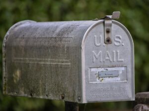 hand delivering discount forever stamped mail to