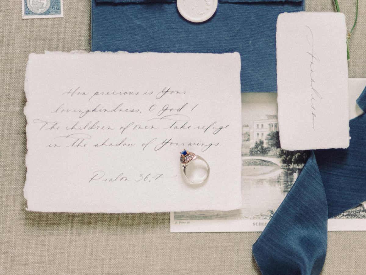 An accountant-minded office lead in Columbus reviewing a Forever Stamp FAQ compilation, checking spreadsheets for USPS rules and stamp usage for professional mailings.